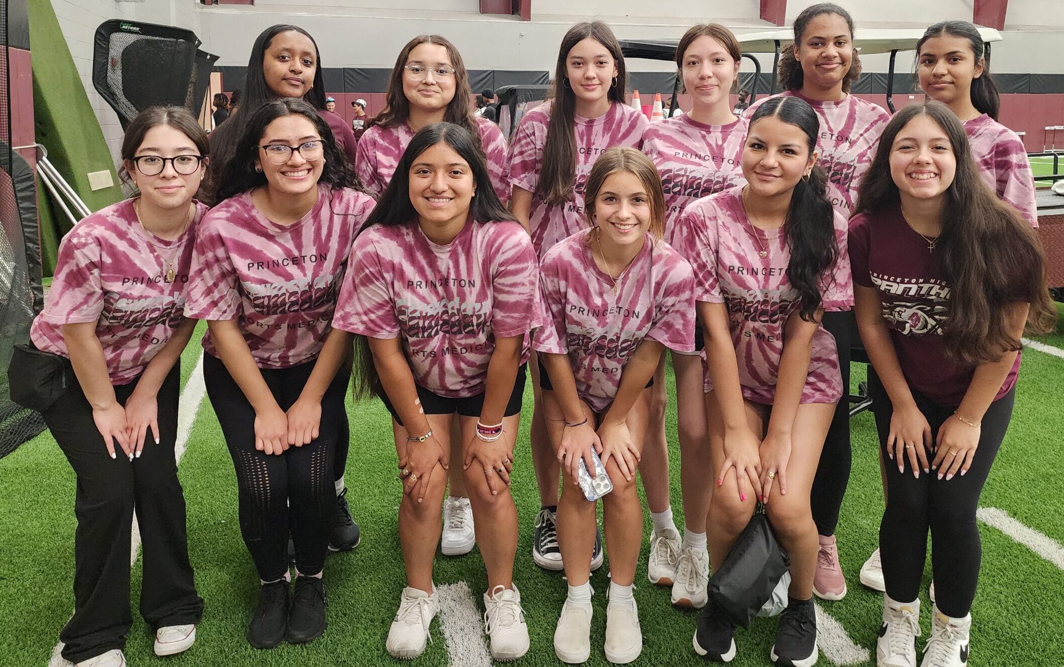 Princeton High School student volunteers at the 2025 sports physicals event hosted in the indoor athletic facility.